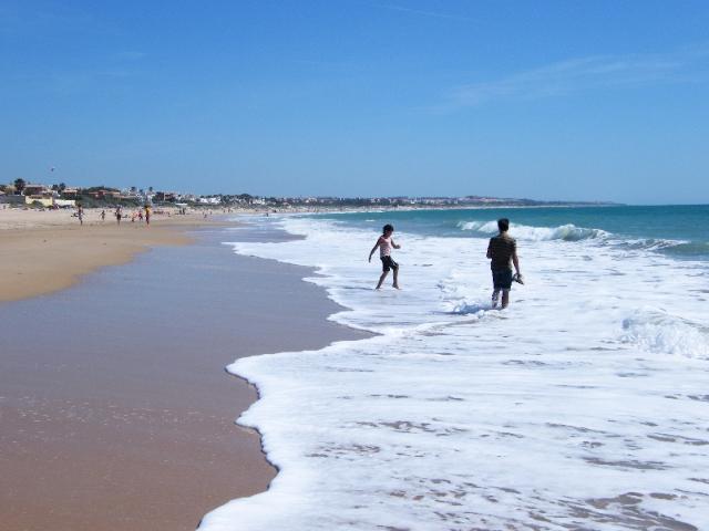 Playing in the Surf at Novo Sancti Petri